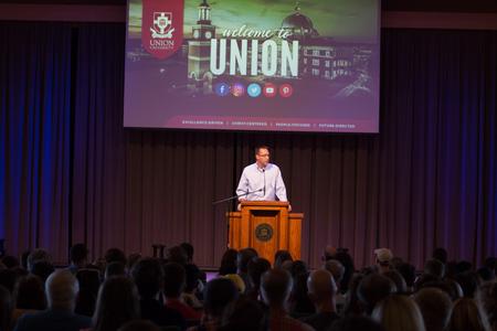 Bryan Carrier, vice president for student life and dean of students, welcomes students to Union University in the Savage Memorial Chapel. - Photo by Gretchen Foels