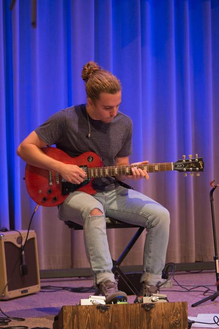 Tanner Cherry plays music during chapel worship. - Photo by Hannah Heckart