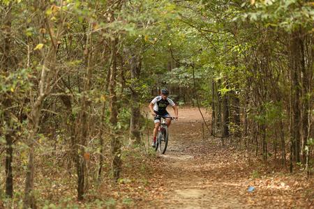 A rider participates in the Family Weekend mountain bike ride on the Union Trails. - Photo by Kristi McMurry Woody