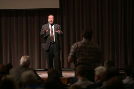 Dr. Bruce Gordon, the Titus Street Professor of Ecclesiastical History at Yale Divinity School and an award-winning author, answers and audience question at the annual Carls-Schwerdfeger History Lecture. - Photo by Kristi McMurry Woody