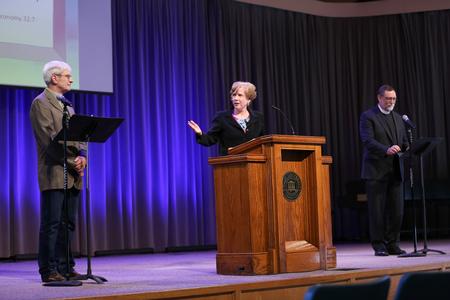 Charlotte Rees speaks in chapel about her ancestor, W.D. Powell. She is joined on stage by her cousins. - Photo by Kristi McMurry Woody