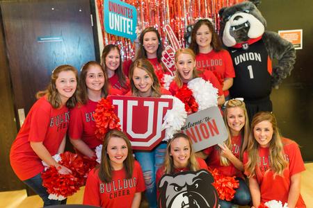 Union cheerleaders pose together during the homecoming pep rally. - Photo by Kristi McMurry Woody