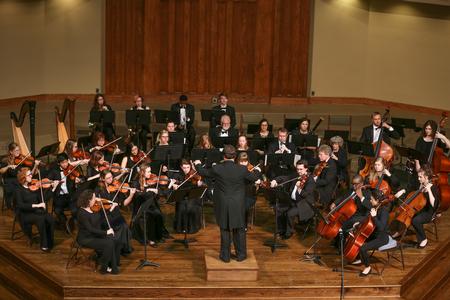 The orchestra, led by Michael Mann, begins their annual fall concert at First Baptist Church. - Photo by Kristi McMurry Woody