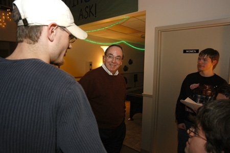 President Dockery spoke with students in the McAfee Commons shortly before his annual reading of the Christmas story. - Photo by Morris Abernathy