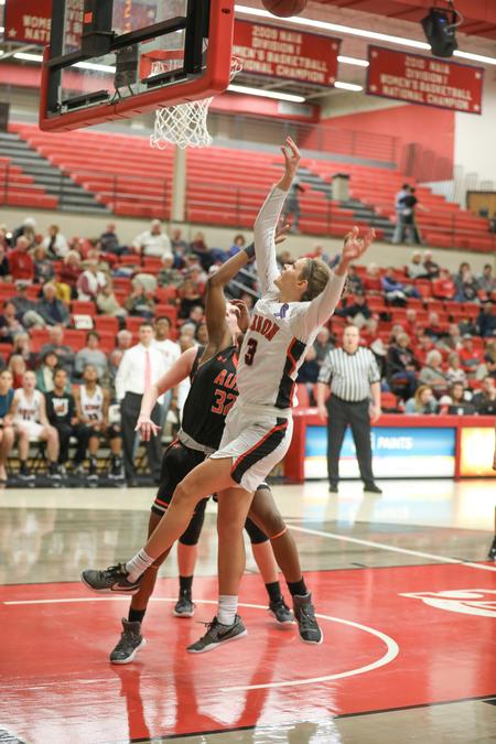 AnnaLea Little goes up for a shot during a basketball game against Auburn University Montgomery. - Photo by Kristi McMurry Woody