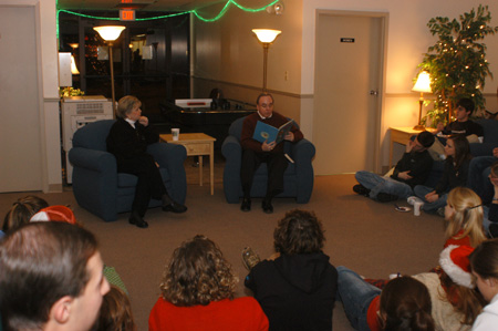 President Dockery and his wife Lanese gathered with students in the McAfee Commons during his annual reading of the Christmas story. - Photo by Morris Abernathy