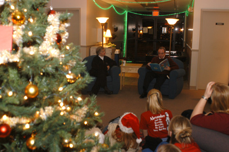 President Dockery and his wife Lanese celebrated Christmas with students in the McAfee Commons during his annual reading of the Christmas story. - Photo by Morris Abernathy