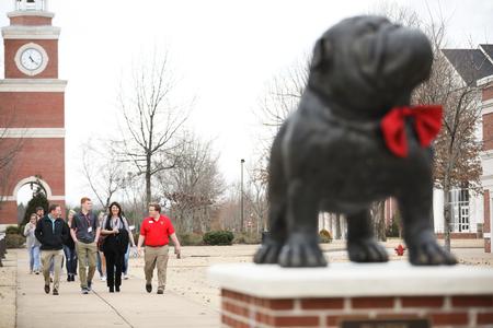 Colby Benefield, enrollment counselor, leads a group of prospective students and their families on a tour during Day at the U. - Photo by Kristi McMurry Woody
