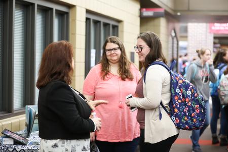 Victoria Malone (left), coordinator of the study abroad program, talks with students during the External Study Fair. - Photo by Kristi McMurry Woody