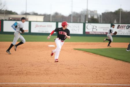 Chase Diggs heads to third base during a game against Harding University. - Photo by Kristi McMurry Woody