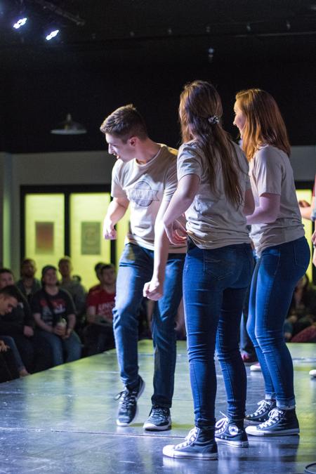 Members of the Blank Slate Improv Team dance onto stage.  - Photo by Janelle Vest