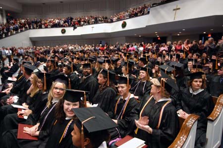After receiving their diplomas, the fall 2004 graduates prepared to tackle their futures. - Photo by Morris Abernathy