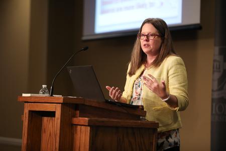 Kristine Steakley, author, speaks during a social work luncheon about ministering to people affected by divorce.  - Photo by Kristi McMurry Woody