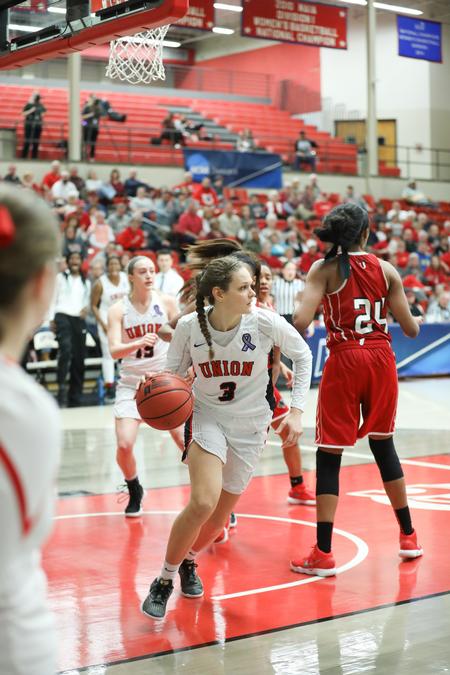 AnnaLea Little takes the ball after a rebound during a tournament game against Clark Atlanta University. - Photo by Kristi McMurry Woody