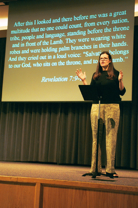 Suzanne Moseley encourages students to participate in a GO trip at the GO Week Chapel Service 2002. - Photo by Justin Veneman