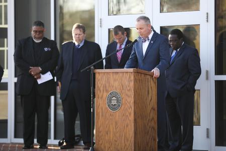 Dub Oliver, president of the university, prays at the beginning of the MLK50 event honoring Martin Luther King Jr. on the 50th anniversary of his assassination.  - Photo by Kristi McMurry Woody