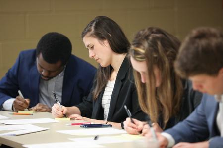 Students brainstorm ideas during the Business Week Case Competition. - Photo by Kristi McMurry Woody