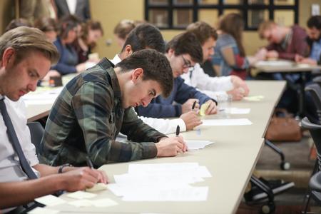 Students work on ideas for the Case Competition during Business Week. - Photo by Kristi McMurry Woody