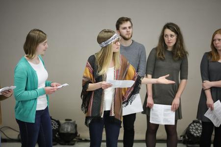 Janey Berends, Spanish major, and her classmates perform for their final project during the Scholarship Symposium. - Photo by Kristi McMurry Woody