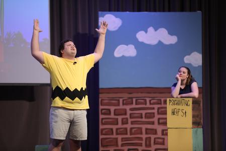 Christopher Hearn, history major, and Caroline Clements, music education major, perform as Charlie Brown and Lucy in the theatre production of "You're a Good Man, Charlie Brown." - Photo by Kristi McMurry Woody