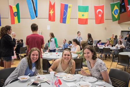 Students enjoy authentic international dishes at this year's International Food Fest. - Photo by Janelle Vest