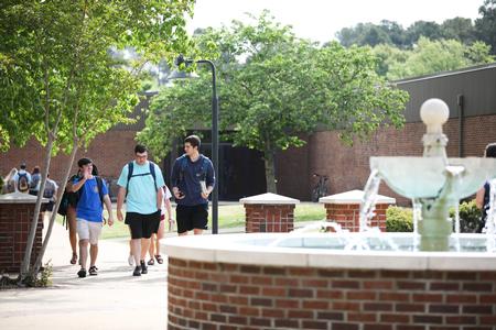 Students walk between classes on a nice spring day at Union University. - Photo by Kristi McMurry Woody