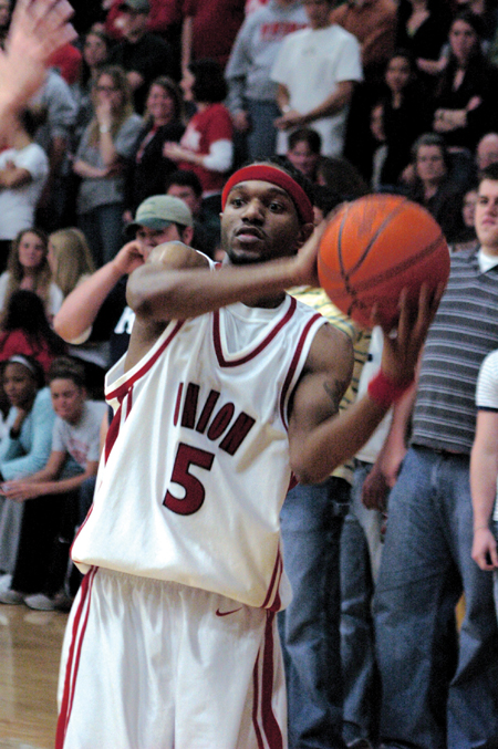 Marcus Cooper (5) looks to pass in Union's win over Lambuth. - Photo by Lauren Crane