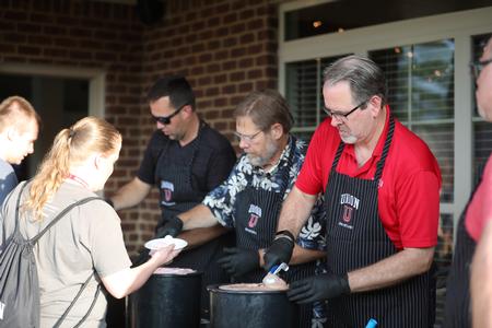Members of the executive council serve ice cream to new students during Welcome Week. - Photo by Kristi McMurry Woody