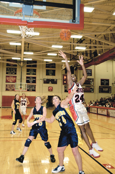 Senior Monica Elliot, management major, leans
into her shot against Blue Mountain College Thursday night. - Photo by Kathleen Murray