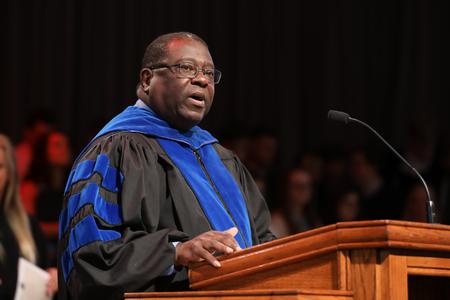 Frank Anderson, director of the Center for Racial Reconciliation, reads passages from Galatians, Titus, 1 Peter and 2 Peter during Convocation. - Photo by Kristi McMurry Woody