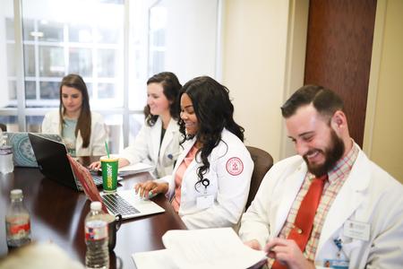 Pharmacy students meet in Providence Hall to go over a case study. - Photo by Kristi McMurry Woody