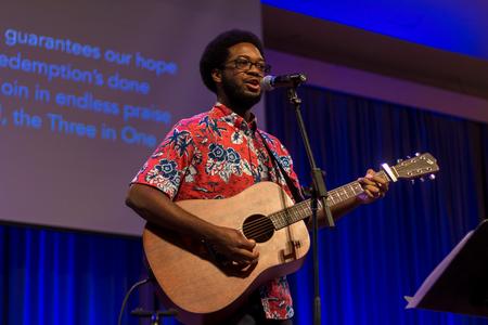 Richard Kidd, worship leadership major, leads students and staff in worship during a chapel service. - Photo by Nikki Grim