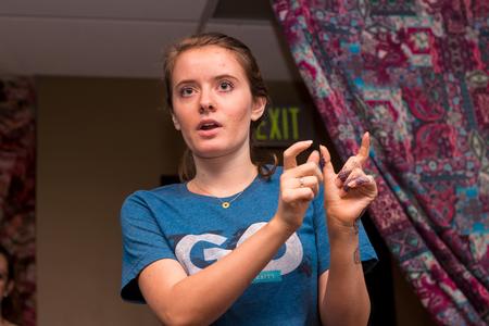 Gillian Gandy, senior business major, speaks during Global Focus Month's women's event, Henna Night. - Photo by Nikki Grim