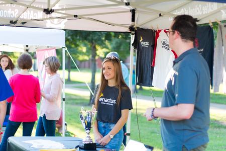 Enactus members sell Union clothing to families and students attending Union Night. - Photo by Nikki Grim