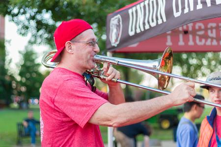 Families of Union students participate in the music department's instrumental petting zoo during Union Night. - Photo by Nikki Grim