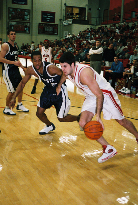 Bruno Martinessi (32), a senior from Paraguay, during the ball to the hoop duing his final game versus Lambuth. - Photo by Steven Aldridge