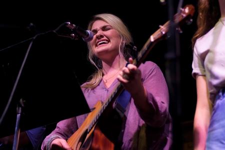 Ashley Cook, sophomore music major, performs at Open Mic in Barefoots Joe. - Photo by Nikki Grim