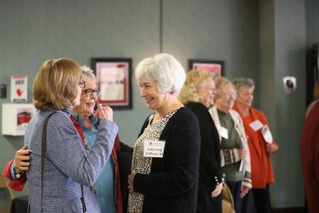 Judy Coffman ('69) mingles with friends before Homecoming Chapel. - Photo by Kristi McMurry Woody