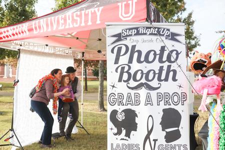Homecoming guests enjoy the Forever Bulldogs event on the Great Lawn. - Photo by Kristi McMurry Woody