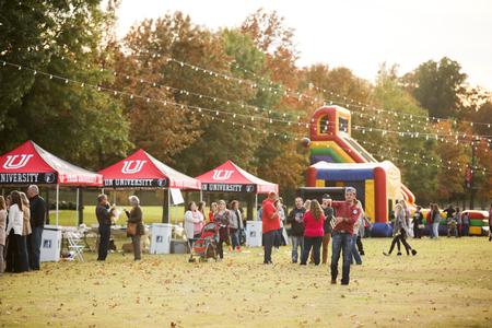 Homecoming guests enjoy the Forever Bulldogs event on the Great Lawn. - Photo by Kristi McMurry Woody