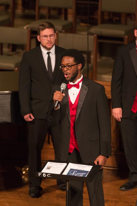Richard Kidd, music major, performs in the Fall Choral Concert. - Photo by Lynn Tucker
