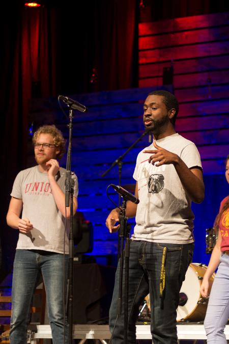 Clark Hubbard, English with honors major, and Korey Adams, Spanish major, perform with Blank Slate Improv during Homecoming. - Photo by Nikki Grim