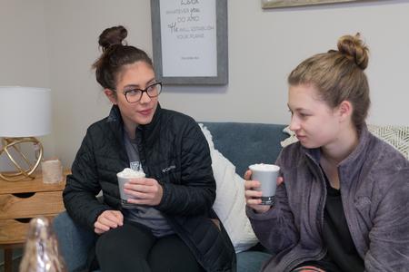 Students enjoy coffee and treats in the Vocatio Center during Stress-Free Friday before finals week. - Photo by Lynn Tucker