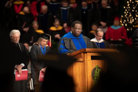 Frank Anderson, associate professor of ministry and missions, closes Fall Commencement with the benediction. - Photo by Kristi McMurry Woody