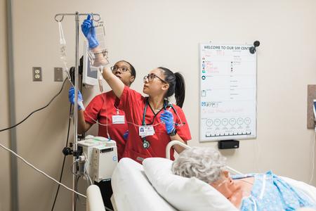 Nursing students run a simulation on the Germantown campus. - Photo by Kristi McMurry Woody