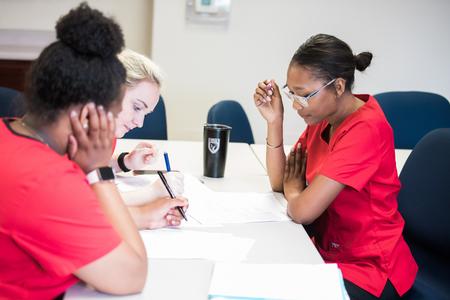 Nursing students on the Germantown campus debrief after doing a simulation in the lab. - Photo by Kristi McMurry Woody