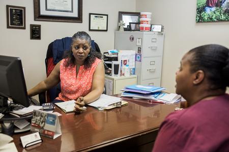 Angela Campbell, social work programming coordinator, meets with a student in her office on the Germantown campus. - Photo by Kristi McMurry Woody