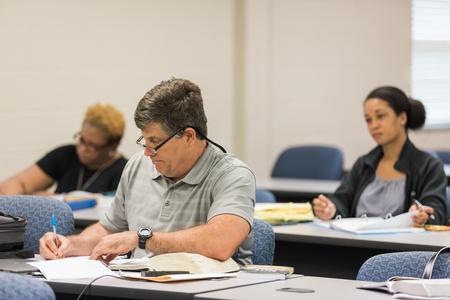 Students on the Germantown campus listen to Paul Jackson's lecture in class. - Photo by Kristi McMurry Woody