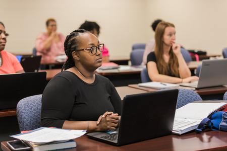 Social work students listen in class on the Germantown campus. - Photo by Kristi McMurry Woody
