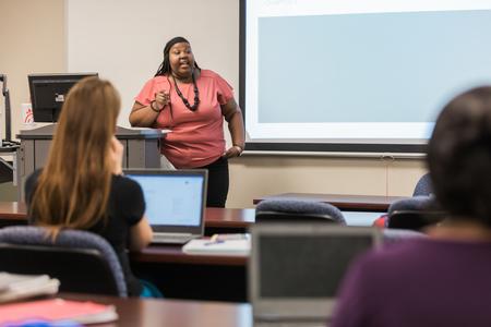 Katrinna Matthews, assistant professor of social work and MSW field director, teaches a class on the Germantown campus. - Photo by Kristi McMurry Woody
